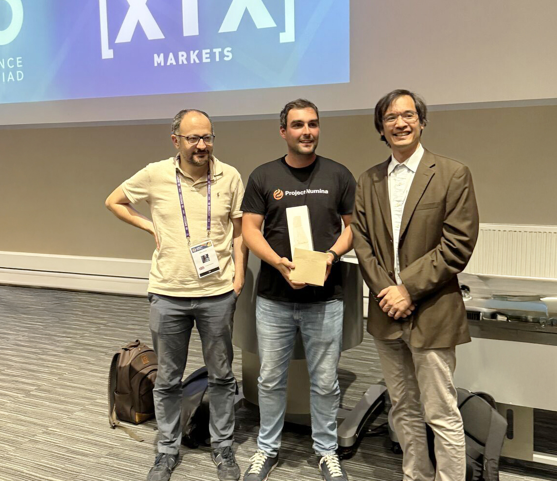 Award ceremony with the XTX prize team